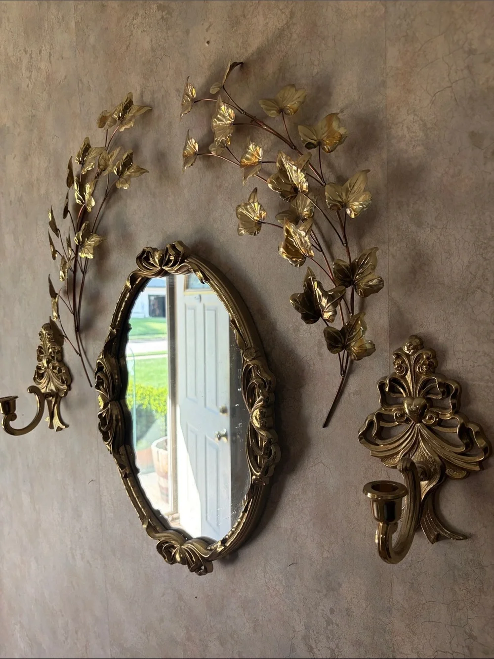 Gold Ornate Oval Wall Mirror with Decorative Leaf Accents